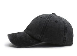 Dark grey unstructured washed cotton baseball cap side view, curved UV protection brim, six panel stitching retro faded cotton texture