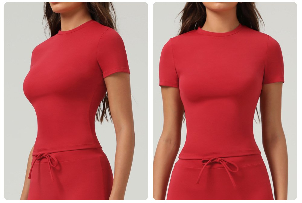 Split dual-angle red seamless stretch sports short sleeve top, front and side waist curve display slim bodycon cropped design neutral studio background
