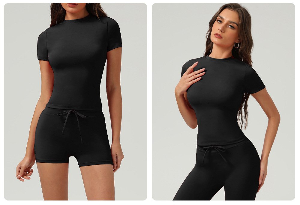 Split layout black seamless sports short sleeve top, match drawstring sports shorts and stretch leggings two styling options gray background