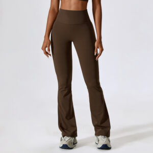 Model in chocolate brown high-waisted flare yoga pants, showcasing the flattering silhouette and soft stretch fabric