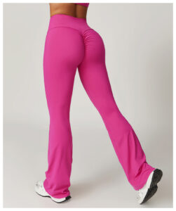 Back view of hot pink high-waisted flare yoga pants, highlighting the scrunch butt detail and flared leg silhouette