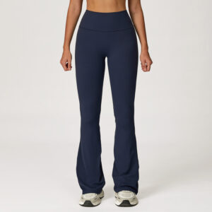 Navy Blue High-Waisted Flare Leggings Navy blue flare yoga pants with a wide waistband and subtle flare, styled with sneakers for a versatile look.