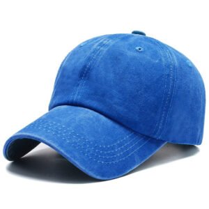 Vibrant royal blue washed cotton baseball cap, retro distressed fabric, multi stitching brim breathable vent holes studio product shot