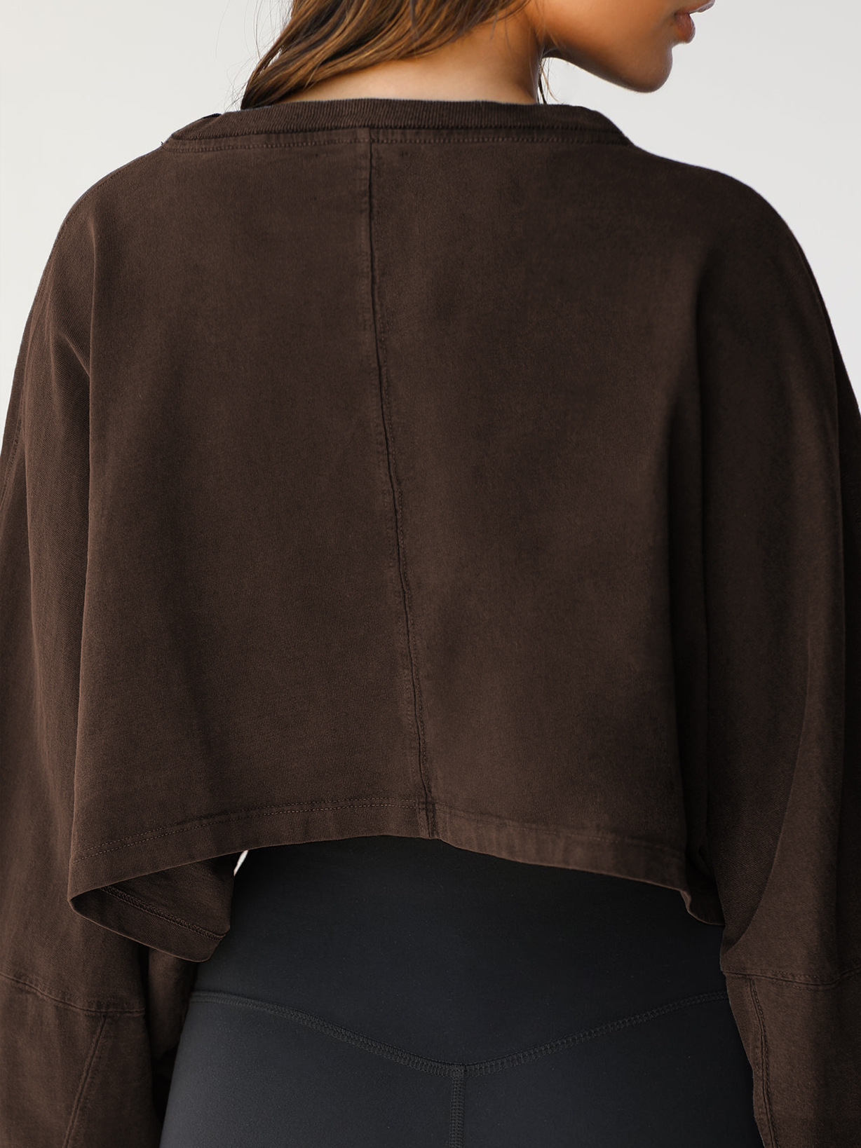 Brown Cropped Sweatshirt - Back Detail View Back view of womens brown oversized cropped sweatshirt, showing center back seam and fabric texture, vintage pigment dyed finish, casual loungewear top