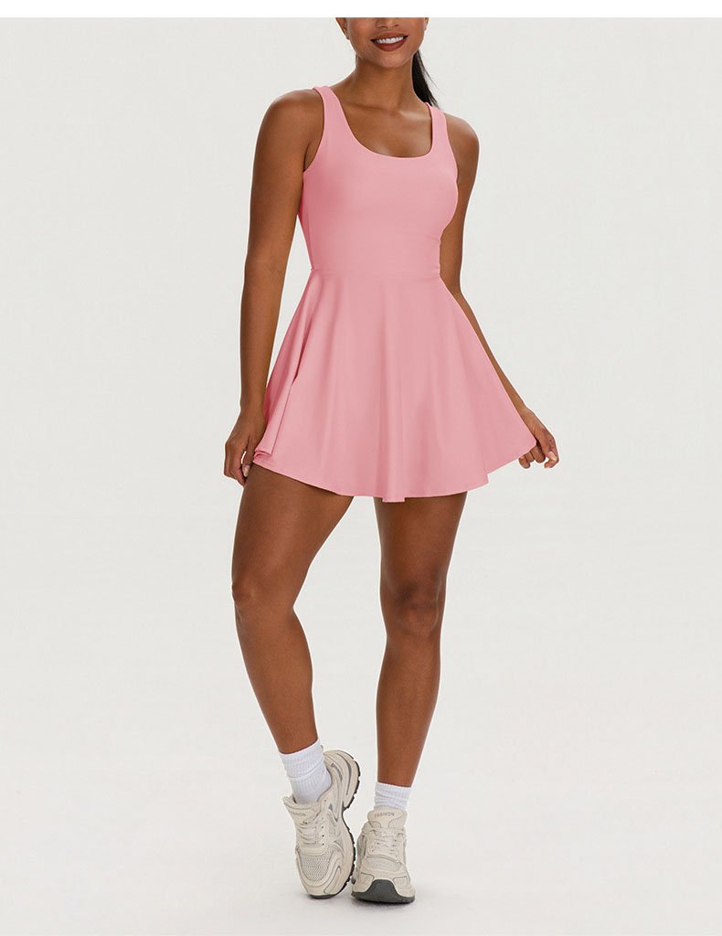 Pink two-piece tennis skirt set scoop neck full body shot