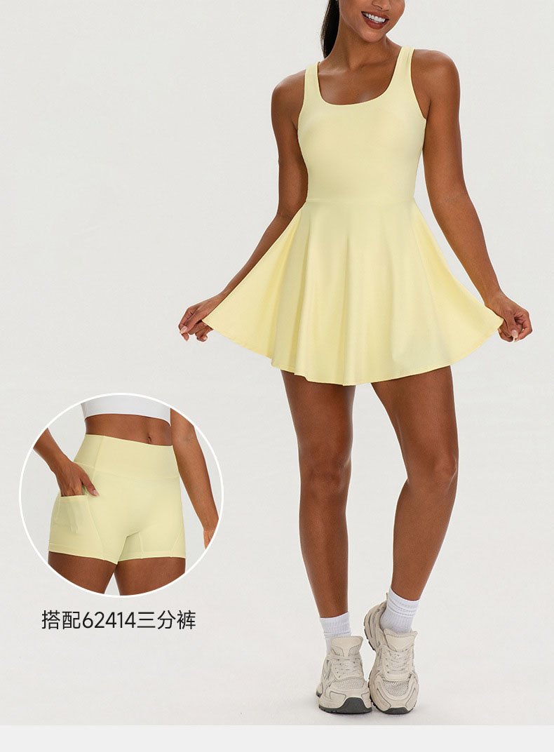 Yellow two-piece tennis skirt set full look with sneakers