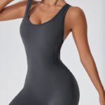 Dark grey back-beautifying hip lifting one-piece garment stretch fabric closeup