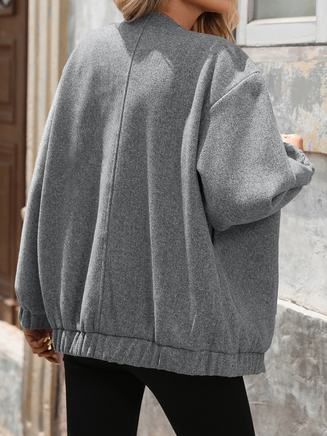 Grey casual woolen jacket rear view ribbed hem loose fit outerwear