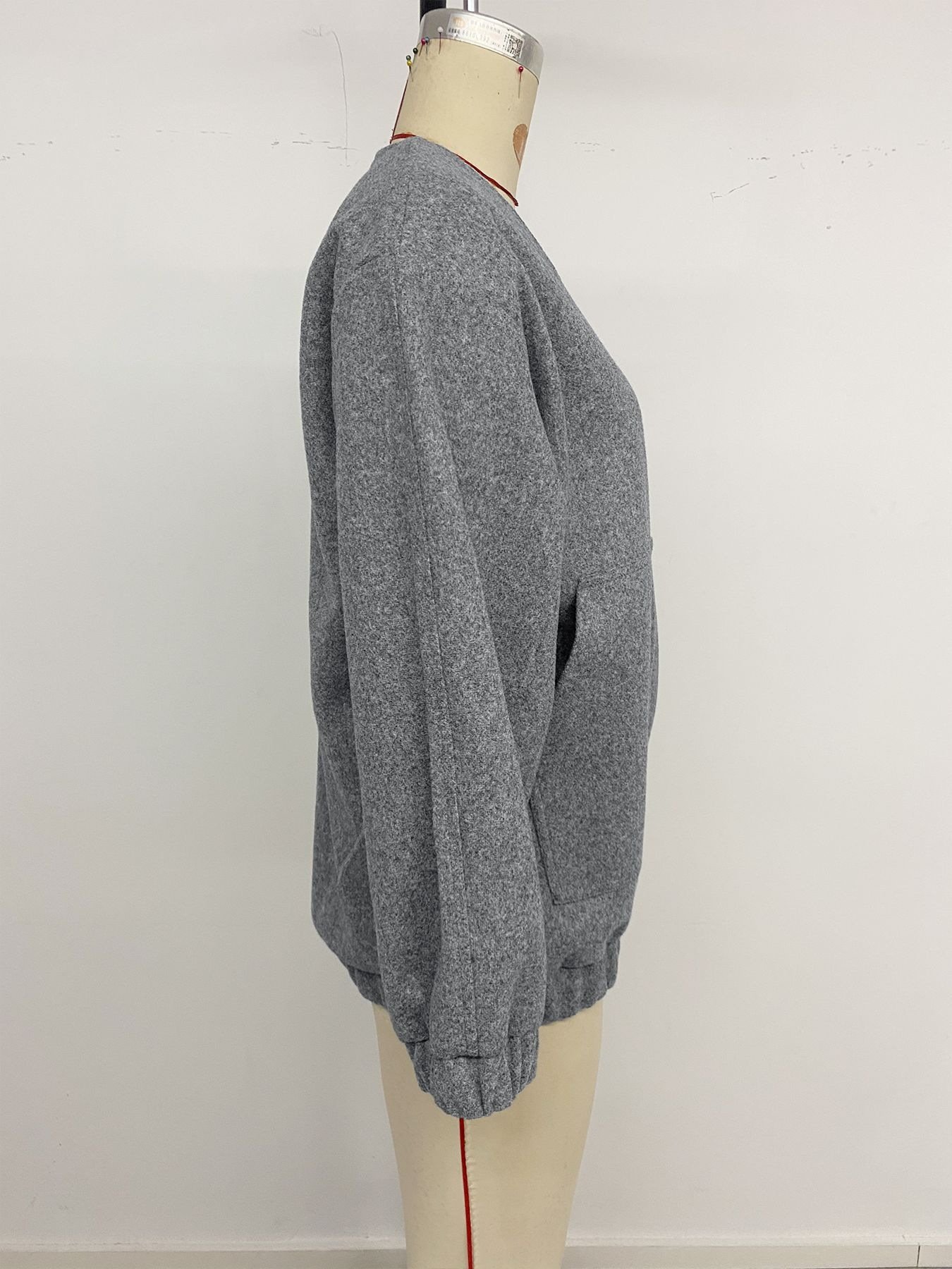 Grey casual woolen jacket side view drop shoulder elastic cuff detail